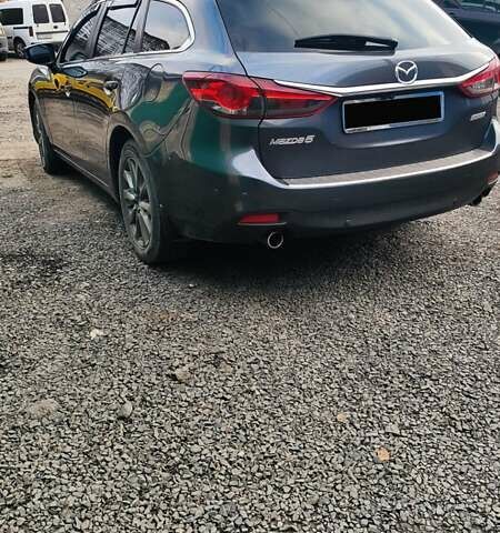 Серый Мазда 6, объемом двигателя 2.19 л и пробегом 226 тыс. км за 10500 $, фото 9 на Automoto.ua