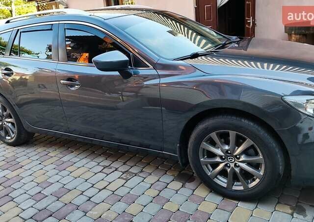 Серый Мазда 6, объемом двигателя 2.19 л и пробегом 226 тыс. км за 10500 $, фото 19 на Automoto.ua