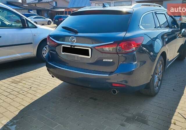 Серый Мазда 6, объемом двигателя 2.19 л и пробегом 226 тыс. км за 10500 $, фото 35 на Automoto.ua