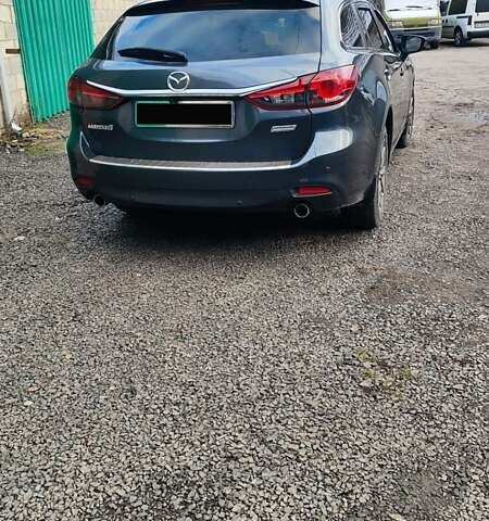 Серый Мазда 6, объемом двигателя 2.19 л и пробегом 226 тыс. км за 10500 $, фото 6 на Automoto.ua