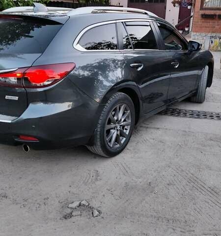 Серый Мазда 6, объемом двигателя 2.19 л и пробегом 226 тыс. км за 10500 $, фото 10 на Automoto.ua