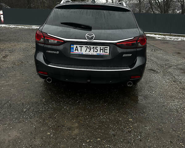 Сірий Мазда 6, об'ємом двигуна 2.19 л та пробігом 317 тис. км за 12800 $, фото 20 на Automoto.ua