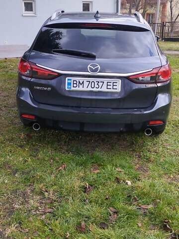 Серый Мазда 6, объемом двигателя 2.19 л и пробегом 232 тыс. км за 10200 $, фото 13 на Automoto.ua