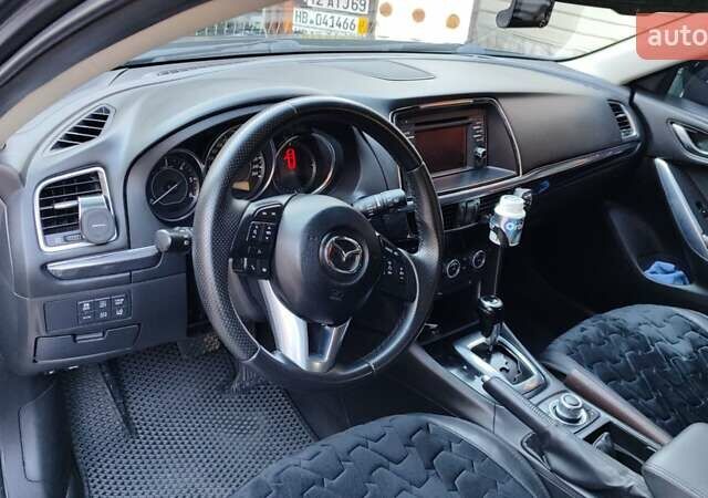 Серый Мазда 6, объемом двигателя 2.19 л и пробегом 226 тыс. км за 10500 $, фото 27 на Automoto.ua