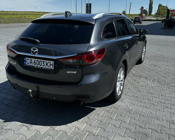 Сірий Мазда 6, об'ємом двигуна 2.19 л та пробігом 260 тис. км за 9500 $, фото 3 на Automoto.ua