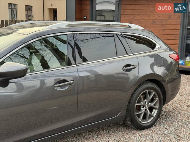 Серый Мазда 6, объемом двигателя 2.19 л и пробегом 226 тыс. км за 10900 $, фото 7 на Automoto.ua