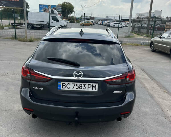 Сірий Мазда 6, об'ємом двигуна 2.18 л та пробігом 292 тис. км за 11000 $, фото 4 на Automoto.ua