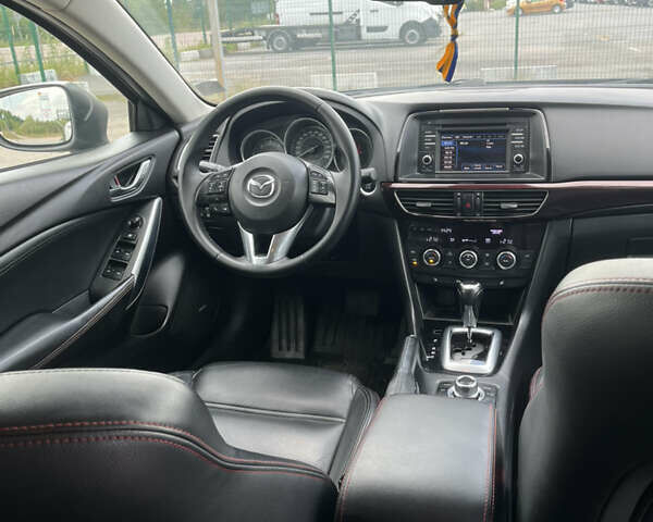 Сірий Мазда 6, об'ємом двигуна 2.18 л та пробігом 292 тис. км за 11000 $, фото 5 на Automoto.ua