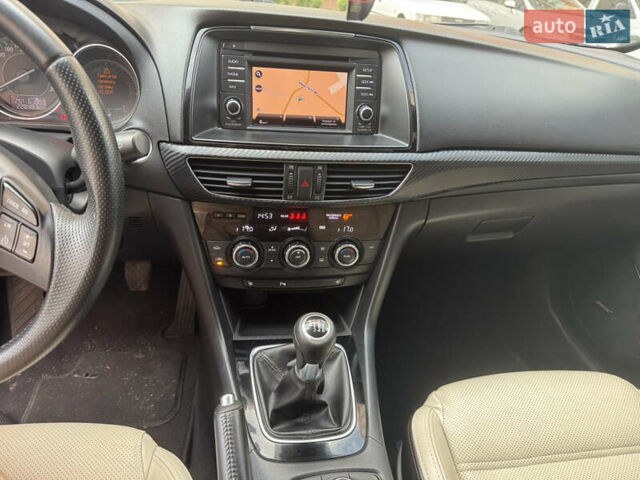 Серый Мазда 6, объемом двигателя 2.19 л и пробегом 228 тыс. км за 11700 $, фото 10 на Automoto.ua