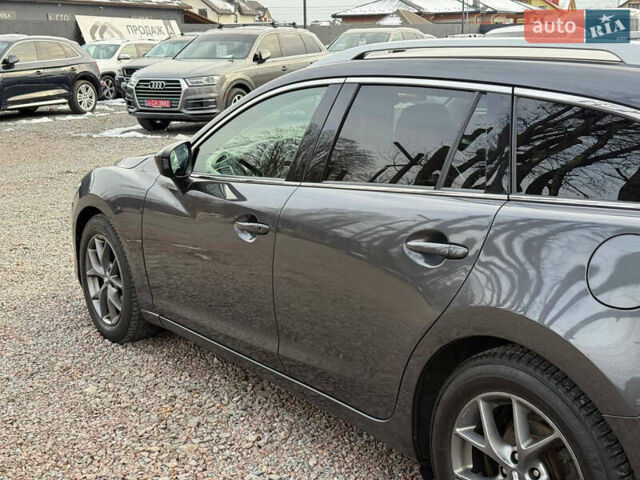 Серый Мазда 6, объемом двигателя 2.19 л и пробегом 226 тыс. км за 10900 $, фото 9 на Automoto.ua