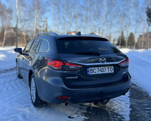 Серый Мазда 6, объемом двигателя 2.18 л и пробегом 292 тыс. км за 9999 $, фото 2 на Automoto.ua