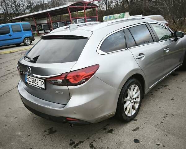 Сірий Мазда 6, об'ємом двигуна 2.19 л та пробігом 228 тис. км за 11500 $, фото 4 на Automoto.ua