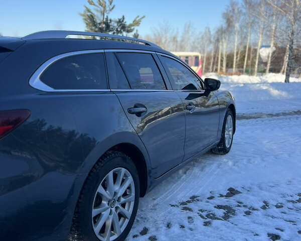 Серый Мазда 6, объемом двигателя 2.18 л и пробегом 292 тыс. км за 9999 $, фото 4 на Automoto.ua