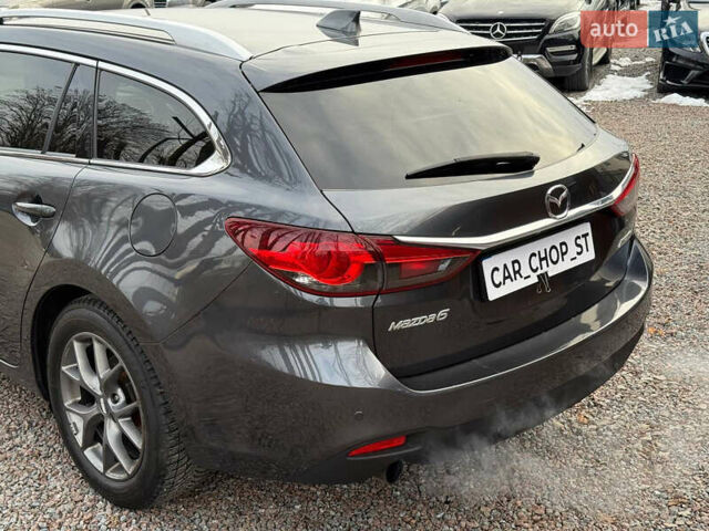 Серый Мазда 6, объемом двигателя 2.19 л и пробегом 226 тыс. км за 10900 $, фото 10 на Automoto.ua