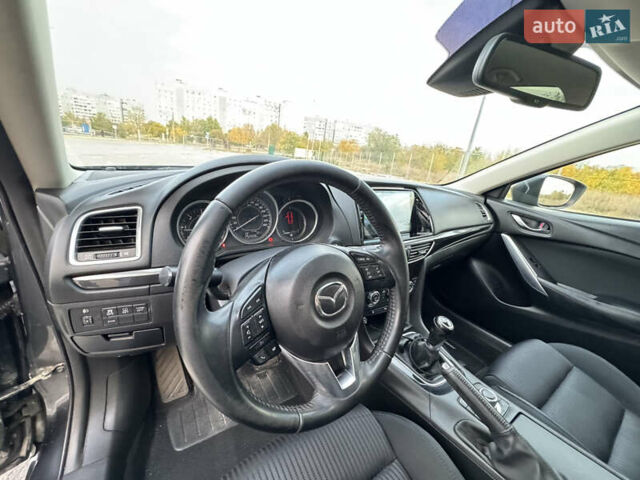 Серый Мазда 6, объемом двигателя 2.18 л и пробегом 293 тыс. км за 10990 $, фото 16 на Automoto.ua