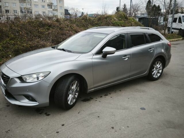 Серый Мазда 6, объемом двигателя 2.2 л и пробегом 235 тыс. км за 11500 $, фото 6 на Automoto.ua