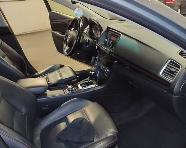 Серый Мазда 6, объемом двигателя 2.19 л и пробегом 243 тыс. км за 10700 $, фото 10 на Automoto.ua