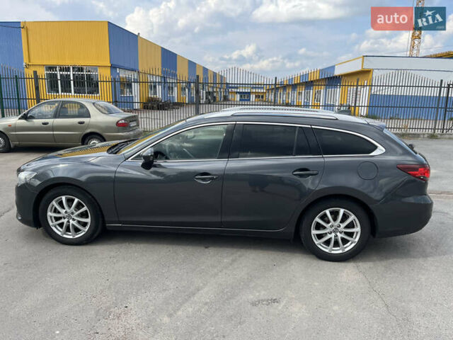 Сірий Мазда 6, об'ємом двигуна 2.18 л та пробігом 292 тис. км за 11000 $, фото 3 на Automoto.ua