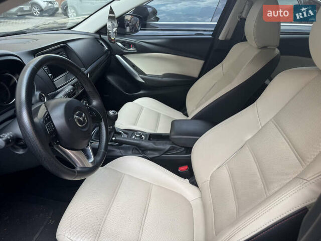 Серый Мазда 6, объемом двигателя 2.19 л и пробегом 228 тыс. км за 11700 $, фото 6 на Automoto.ua