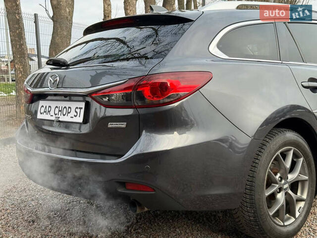 Серый Мазда 6, объемом двигателя 2.19 л и пробегом 226 тыс. км за 10900 $, фото 15 на Automoto.ua