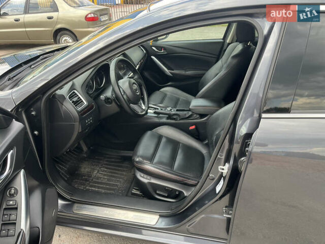 Сірий Мазда 6, об'ємом двигуна 2.18 л та пробігом 292 тис. км за 11000 $, фото 9 на Automoto.ua