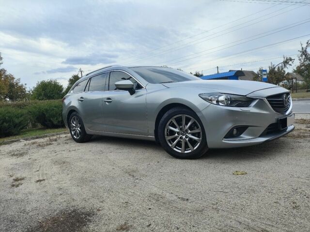 Серый Мазда 6, объемом двигателя 2.2 л и пробегом 195 тыс. км за 12500 $, фото 1 на Automoto.ua