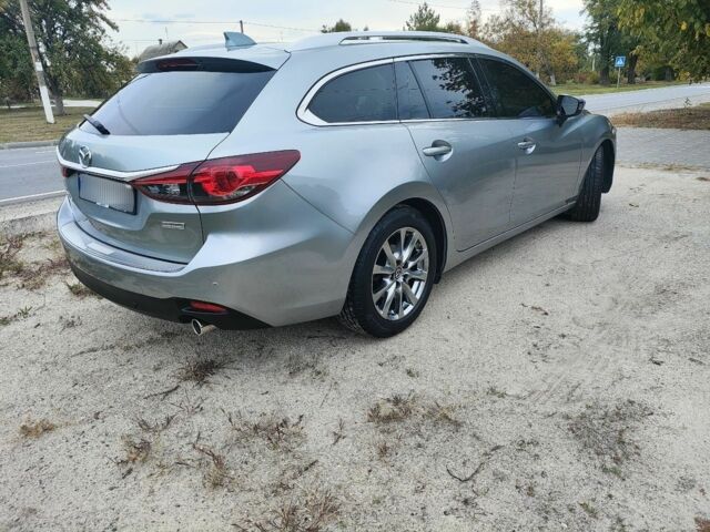 Серый Мазда 6, объемом двигателя 2.2 л и пробегом 195 тыс. км за 12500 $, фото 2 на Automoto.ua