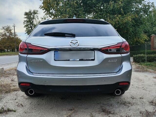 Серый Мазда 6, объемом двигателя 2.2 л и пробегом 195 тыс. км за 12500 $, фото 6 на Automoto.ua