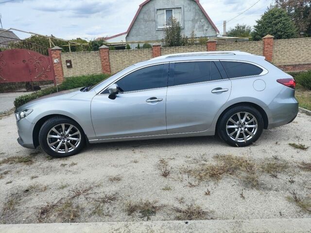 Серый Мазда 6, объемом двигателя 2.2 л и пробегом 195 тыс. км за 12500 $, фото 5 на Automoto.ua