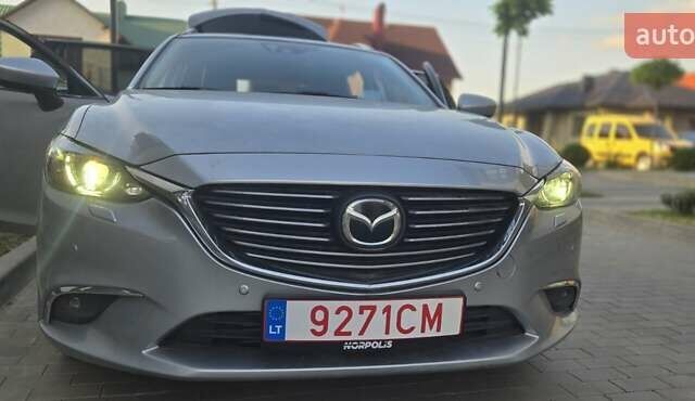 Серый Мазда 6, объемом двигателя 2.19 л и пробегом 243 тыс. км за 13800 $, фото 21 на Automoto.ua