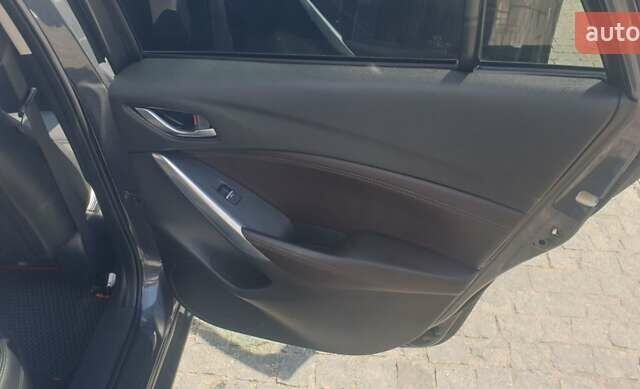 Серый Мазда 6, объемом двигателя 2.19 л и пробегом 215 тыс. км за 13500 $, фото 10 на Automoto.ua