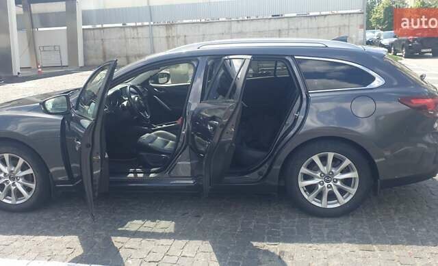 Серый Мазда 6, объемом двигателя 2.19 л и пробегом 215 тыс. км за 13500 $, фото 13 на Automoto.ua