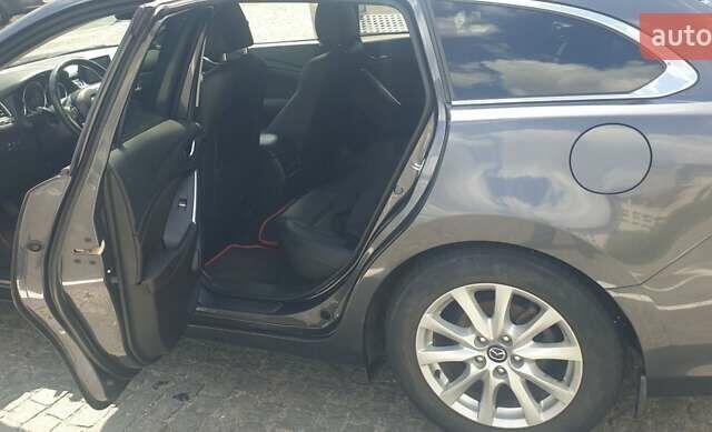 Серый Мазда 6, объемом двигателя 2.19 л и пробегом 215 тыс. км за 13500 $, фото 5 на Automoto.ua