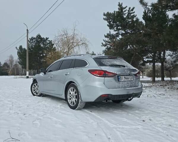 Серый Мазда 6, объемом двигателя 2.19 л и пробегом 273 тыс. км за 13000 $, фото 4 на Automoto.ua