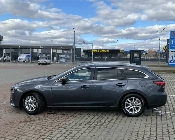 Серый Мазда 6, объемом двигателя 2.19 л и пробегом 235 тыс. км за 13100 $, фото 4 на Automoto.ua