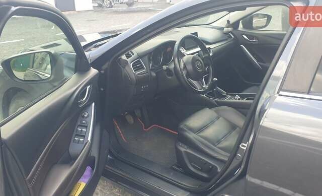 Серый Мазда 6, объемом двигателя 2.19 л и пробегом 215 тыс. км за 13500 $, фото 15 на Automoto.ua