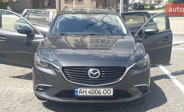 Серый Мазда 6, объемом двигателя 2.19 л и пробегом 215 тыс. км за 13500 $, фото 8 на Automoto.ua