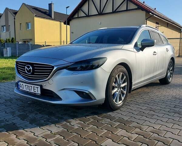 Серый Мазда 6, объемом двигателя 2 л и пробегом 188 тыс. км за 13500 $, фото 6 на Automoto.ua