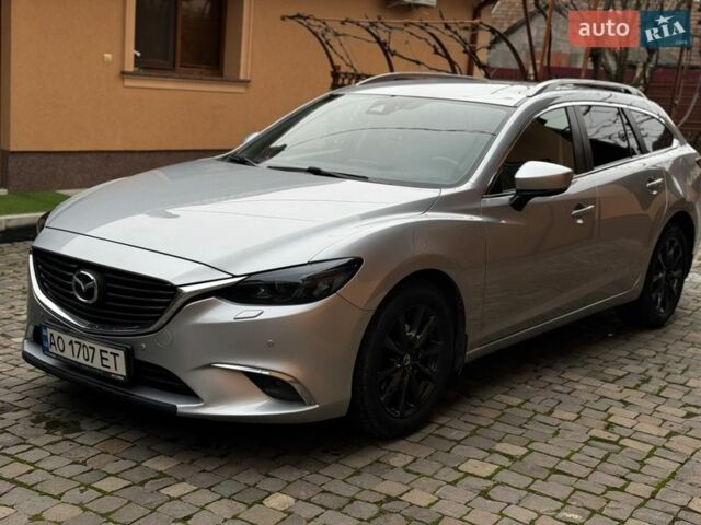 Серый Мазда 6, объемом двигателя 2 л и пробегом 190 тыс. км за 12900 $, фото 1 на Automoto.ua
