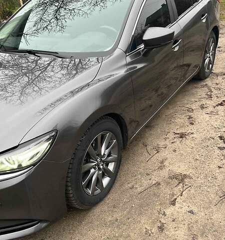 Серый Мазда 6, объемом двигателя 2 л и пробегом 112 тыс. км за 18853 $, фото 1 на Automoto.ua