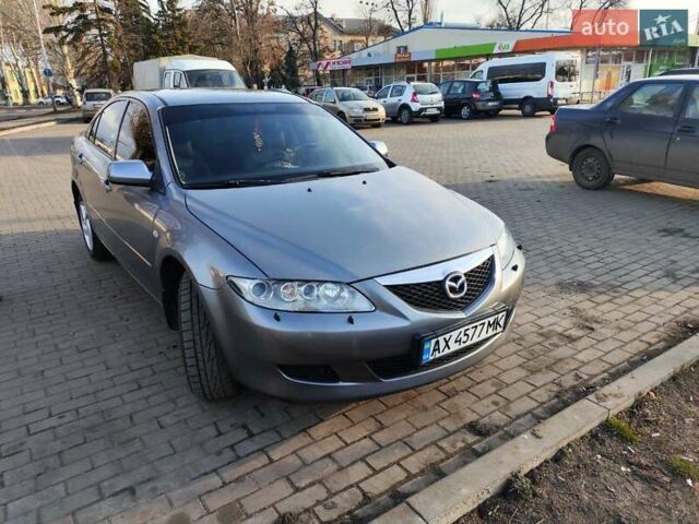 Серый Мазда 6, объемом двигателя 2 л и пробегом 312 тыс. км за 4300 $, фото 2 на Automoto.ua