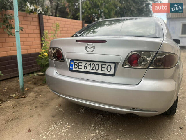 Сірий Мазда 6, об'ємом двигуна 2 л та пробігом 303 тис. км за 3700 $, фото 5 на Automoto.ua