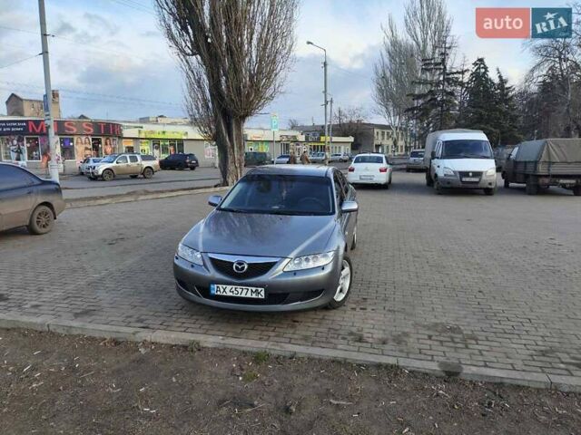 Серый Мазда 6, объемом двигателя 2 л и пробегом 312 тыс. км за 4300 $, фото 5 на Automoto.ua
