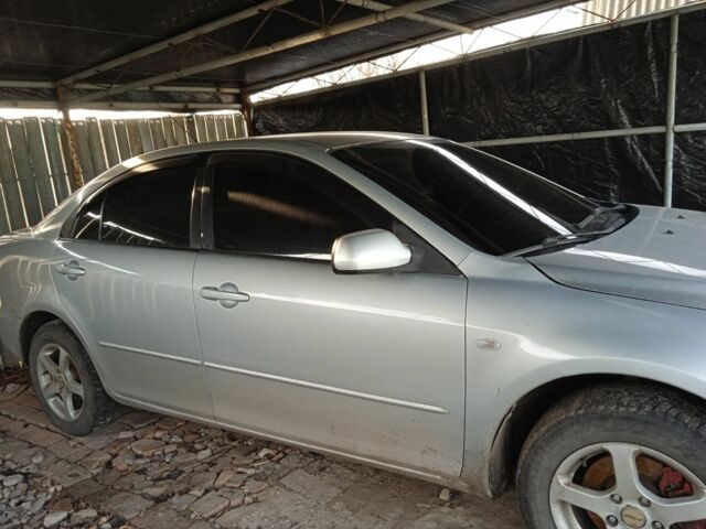 Серый Мазда 6, объемом двигателя 2 л и пробегом 246 тыс. км за 4200 $, фото 4 на Automoto.ua