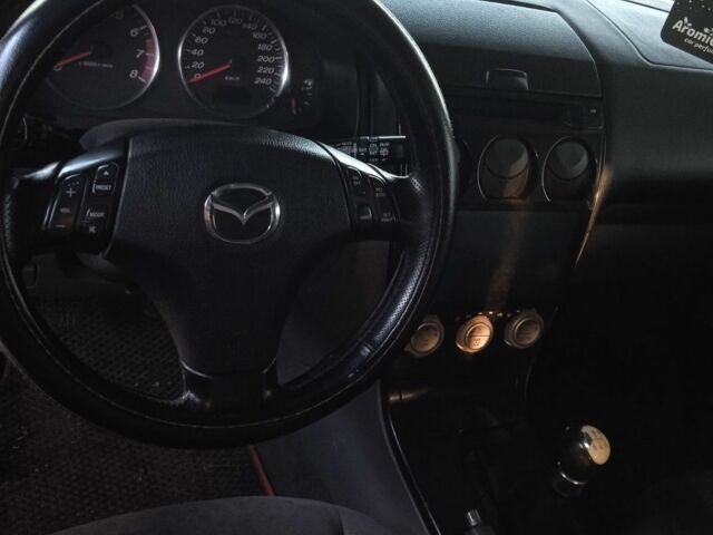 Серый Мазда 6, объемом двигателя 2 л и пробегом 246 тыс. км за 4200 $, фото 7 на Automoto.ua