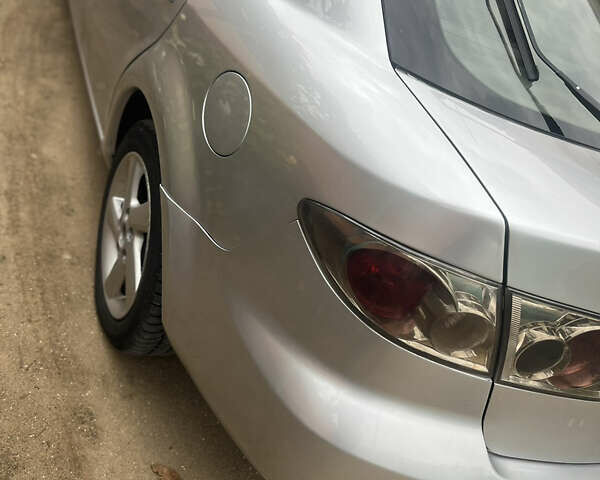 Сірий Мазда 6, об'ємом двигуна 2 л та пробігом 303 тис. км за 3700 $, фото 4 на Automoto.ua