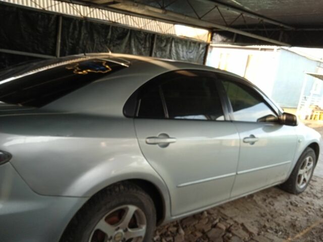 Серый Мазда 6, объемом двигателя 2 л и пробегом 246 тыс. км за 4200 $, фото 3 на Automoto.ua