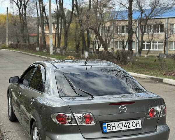 Серый Мазда 6, объемом двигателя 2 л и пробегом 243 тыс. км за 4200 $, фото 3 на Automoto.ua