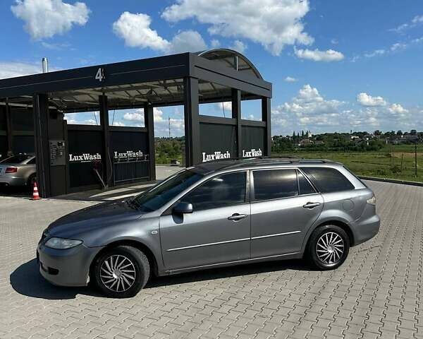 Серый Мазда 6, объемом двигателя 2 л и пробегом 280 тыс. км за 2550 $, фото 9 на Automoto.ua