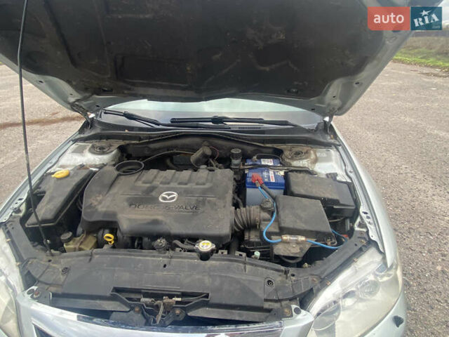 Серый Мазда 6, объемом двигателя 2 л и пробегом 251 тыс. км за 6100 $, фото 30 на Automoto.ua